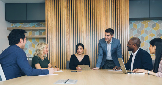 Boardroom discussion on asset valuation and due diligence