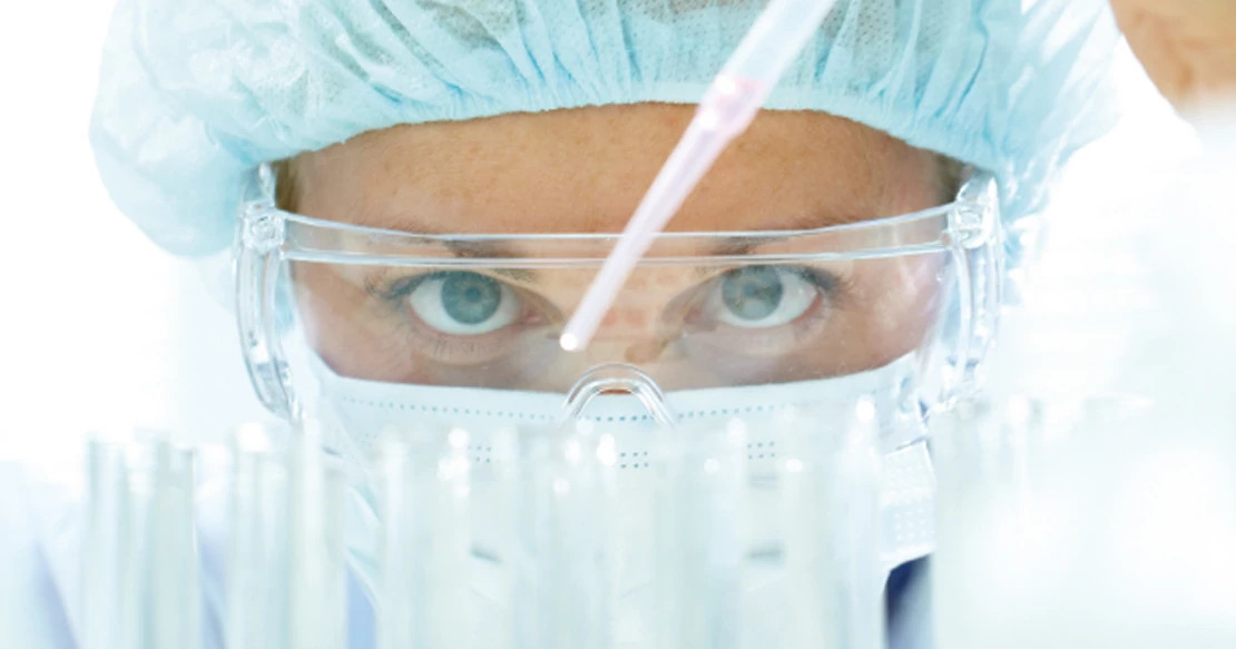 Oncology specialist examining patient charts