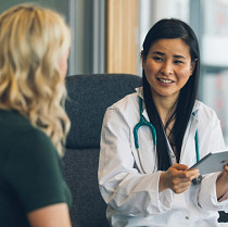 Neurologist consulting with patient