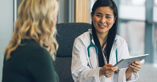 Neurologist consulting with patient