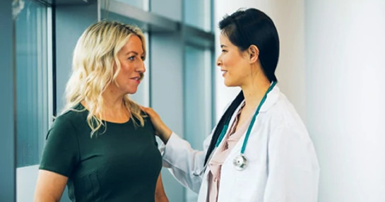 Female physician examining patient