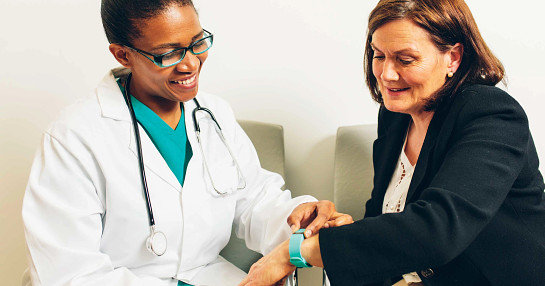 Doctor demonstrating wearable technology