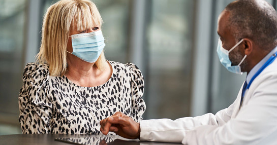 Doctor consulting with study patient