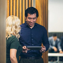 man-using-an-ipad-with-woman.jpg
