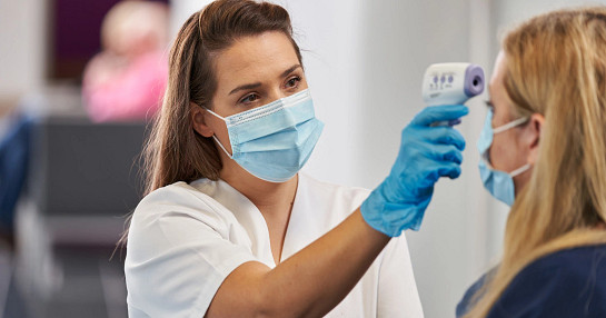 Temperature screening in COVID-19 trials