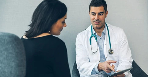 Doctor consulting with patient