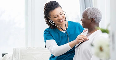 Physician examining obese patient